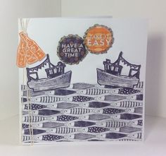 a handmade card with an orange and black boat on the water, says have a great time