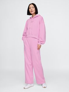 Soft fleece knit wide-leg sweatpants.  Elasticized waist.  Front slant pockets.  Seam at front.  Mid rise.  Straight silhouette with a relaxed fit.  Wide leg.  Models wearing Gap Wide Leg Sweatpants Outfit, Sweatpants Outfit, Wide Leg Sweatpants, Vintage Soft, Pink Sweatshirt, Track Pants, Sweatshirts Women, Mid Rise, Gap