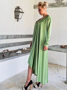 NEW Evening Maxi Dress / Pear Green Plus Size Dress / Evening Dress / Maxi Dress / Party Dress / Plus Size Dress / Open Back Dress / Summer Dress / Long Sleeve Dress / #35266 NEW 2018.... A must have maxi dress...! With long sleeves and open back cut out ! Ideal for all body-types, you can have a very elegant appearance ! - Handmade item - Materials : crystal jersey - The model wears : size - one size , color - Pear Green PLEASE NOTE : The dress is ONE SIZE but you have to choose a size from XS Green Maxi Length Long Sleeve Party Dress, Green Long Sleeve Maxi Dress For Party, Flowy Long Sleeve Summer Party Dress, Long Green Midi Dress For Evening, Green V-neck Party Dress For Spring, Green V-neck Spring Party Dress, Green Spring V-neck Party Dress, Green Long Sleeve Asymmetrical Party Dress, Green Long Sleeve Asymmetrical Dress For Spring