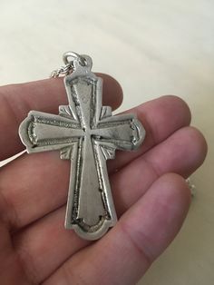 This is a vintage silver 925 unisex Christian Cross. It is hallmarked 925. It is decorated with a beautiful textured pattern. It comes with a thick silver chain. Please contact me if you want a different chain or if you don't want a chain at all! Please contact me for any inquiry you might have! Thank you for visiting Curiose Vintage Shop 🖤 Jordan Cross length: 5.5 cm/ 2.15 inches Chain total length: 48 cm/ 18.9 inches Total weight: 20 gr. It will be sent registered (A class priority) and you w Antique Nickel-free Cross Pendant Jewelry, Vintage Cross Shaped Metal Jewelry, Vintage Cross-shaped Metal Jewelry, Vintage White Gold Cross Jewelry, Vintage Etched Sterling Silver Jewelry, Silver Etched Cross Pendant Necklace, Silver Etched Cross Pendant Jewelry, Vintage Silver Cross Pendant Jewelry, Vintage Antique Silver Cross Necklace