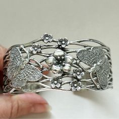 Stunning 999 Silver Flowers Vines Butterflies Cuff Bracelet. Gorgeous Cuff Bracelet Of Almost Pure Silver Has Art Deco Vibe With Vines, Flowers And Butterflies. Cuff Is 30 Mm Wide At Widest, 7 Inches Long Inside With 0.75 Inch Gap. Marked S999. 53g Vines Flowers, Silver Flower Bracelet, Butterfly Cuff, Flowers Vines, Flowers And Butterflies, Flowering Vines, Wrist Cuffs, Flower Bracelet, Silver Flowers