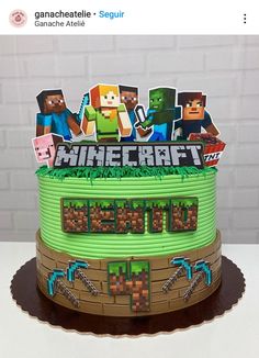 a cake that is made to look like the video game minecraft logo on it