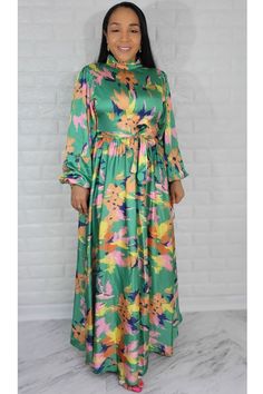 Material: Satin Style: Maxi Dress Long Sleeve Color: Green & Mul Fit True to size. The model is wearing a size Small with 36 Bust Size Recommended Small = 4/6 Medium= 8 Large= 10 XL = 12 1XL= 14