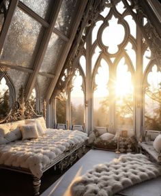 an ornate bedroom with large windows and white fur rugs on the floor in front of it