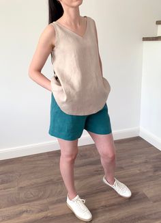 Natural eco-friendly loose washed linen tank top for women's. Made with love for You. *100% local medium weight linen *Breathable tissue *Each item is individually cut and sewn by order *The model is wearing size M, top color - beige *The model is height is 168 cm *The length from shoulder to hem 65 cm *Note that colors may look different on your display depending on their settings and technical characteristics. Please let us know if you need different measurements or colors. CARE: *Machine wash Casual Linen Beach Vest, Casual Everyday Linen Vest, Summer Beach Linen Vest, Casual Flax Linen Tank Top, V-neck Linen Vest For Summer, V-neck Linen Summer Vest, Casual Linen Tank Vest, Beige Linen Tank Top For Beach, Casual Sleeveless Flax Tank Top