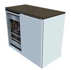 a white refrigerator freezer sitting inside of a wooden counter top next to a bottle opener