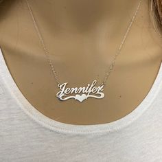 Description: 925 Sterling Silver Name Plate Heart Necklace - Jennifer Item No.: C01 Metal Type: .925 Sterling Silver With Stamped 925 Finish: High Polish Measurement: 16" - 18 Inches. Pendant: 1.5" X 0.75" Brand New With Box Nickel Free Sterling Silver Name Necklace, Nickel-free Sterling Silver Name Necklace, White Sterling Silver Heart Necklace, Sterling Silver Name Necklace Gift, Stamped 925 Necklaces For Mother's Day, Sterling Silver Name Necklace As Gift, Stamped 925 Silver Necklaces For Mother's Day, Sterling Silver Name Necklace As A Gift For Her, Silver Heart Pendant Name Necklace As Gift For Her