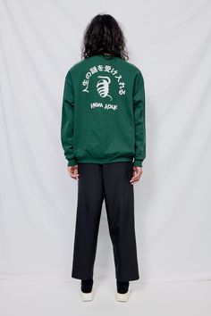 Forest Green Embrace Mystery Sweatshirt from Assembly New York. Text translates to "Embrace The Mystery of Life". Ribbed collar, cuffs and hem. Relaxed fit. - 9.5oz 50/50 blend - Machine Wash Cold - Carmen is 5'10 and wears a size 2, shown in size large - Naoki is 6'2 with a 29" waist, shown in size extra large Size 2, Forest Green, Adidas Jacket, Bomber Jacket, Athletic Jacket, Relaxed Fit, Sweatshirts, How To Wear