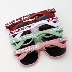 five pairs of sunglasses with the words victoria before vos written on them, sitting next to each other