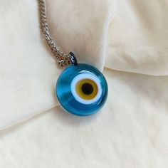 Evil Eye Necklace, Blue Unique Evil Eye Charm, Brown Nazar Necklace, High Quality Glass Evil Eye Jewelry, Handmade Protection Choker Gift Evil eye protection is an ancient belief that helps to protect its owner from jealous eyes. It brings good luck. Also some cultures believe that evil eye necklace brings good health. I hope wearing this jewelry helps your stress, struggles in your daily life <3 All of the glass evil eyes have their own shape, they are handmade and unique. It is a high quality Blue Glass Spiritual Necklaces, Blue Amulet Necklace As Gift, Blue Amulet Necklace For Gift, Handmade Blue Glass Necklaces, Handmade Light Blue Spiritual Necklaces, Traditional Blue Glass Necklaces, Evil Eye Pendant, Evil Eye Charm, Evil Eye Necklace