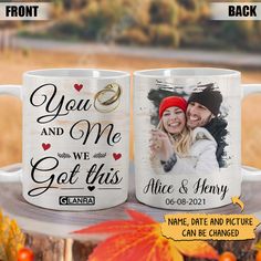 two personalized coffee mugs with the same photo and text on them, sitting on a tree stump