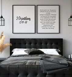 a bedroom with two framed pictures above the bed