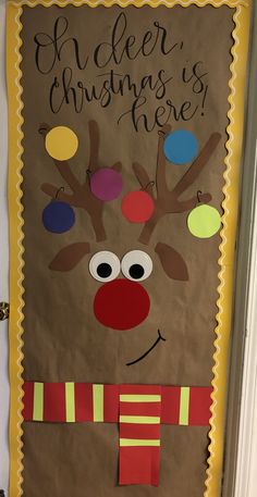 a christmas door decoration with reindeer's head