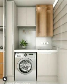 a washer and dryer in a small room