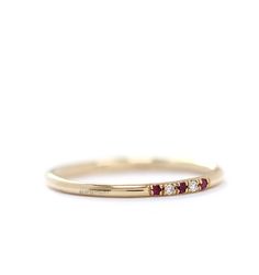 -Dainty solid gold band in the picture is set with 3 ruby and 2 white diamond in a micropave set. -This band measures approximately 1.30mm thickness in full round. -1mm white fine quality diamonds ( Color:F, Clarity:VS ,CONFLICT-FREE) and 1mm red rubies or blue sapphire. -This ring could be perfectly matched my other pettie rings. -The diamonds and rubies also can be set half of band (half eternity ring).Please contact me if you request about number of Rubies and diamonds. Priced upon request. - Diamond Ruby Ring With Pave Setting For Wedding, Wedding Ruby Ring With Pave Setting Round Cut, Gold Ruby Ring With Pave Setting For Wedding, Classic Ruby Ring With Pave Setting For Wedding, Rings Ruby, Solid Gold Band, Half Eternity Ring, Diamond Wedding Ring, Wedding Etsy