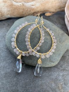 Sweet gemstone beaded hoop earrings .. crafted with hand forged gold tone hoops with hand wire wrapped Rose Quartz gemstones accented with hand wire wrapped clear Quartz gemstones . These beauties measure 3 inches in length . Wire Wrapped Rose Gold Hoop Jewelry, Rose Gold Wire Wrapped Hoop Jewelry, Rose Gold Wire Wrapped Hoop Earrings, Wire Wrapped Beaded Hoop Earrings Gift, Gold Wire Wrapped Hoop Crystal Earrings, Hoop Beaded Earrings Wire Wrapped As Gift, Gift Beaded Hoop Earrings Wire Wrapped, Wire Wrapped Rose, Quartz Gemstones