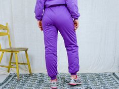 "AUNT GERTRUDE PRESENTS - vintage 90's purple tracksuit - brand: Skis Dynastar - lined, insulated - material: 100% cotton CONDITION (1-10 ❶❷❸❹❺❻❼❽ Good vintage condition SIZE/MEASUREMENTS size from label: XL TOP chest: 52 inches (132 cm) length: 23,5 inches (60 cm) sleeve length from armpit: 18 inches (46 cm) PANTS waist: 33-40 inches (84-102 cm) elastic waist hips: 44 inches (112 cm) rise: 12 inches (31 cm) length: 40 inches (101 cm) inseam: 30 inches (76 cm) The model is 5'9\" (174 cm), measur Winter Jogging Tracksuit With Elastic Waistband, Winter Tracksuit With Elastic Waistband For Jogging, Sportswear Tracksuit With Elastic Waistband For Streetwear, Winter Sporty Tracksuit With Elastic Waistband, Winter Sports Activewear In Purple, Athleisure Tracksuit With Elastic Cuffs For Streetwear, Purple Relaxed Fit Sporty Sweatpants, Winter Joggers Fitted For Jogging, Fitted Winter Joggers For Jogging