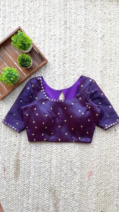 Product Descriptions : Deep purple silk blouse comes with threads exclusive mirror hand works for neck & sleeves and silk butta works all over the blouse as shown Purple Blouse Designs, Saree Jacket, Saree Jacket Designs, Worked Blouse, Saree Jackets, Jacket Designs, Silver Blouse, Mirror Work Blouse, Dress Flats