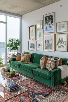 a living room filled with lots of furniture and pictures on the wall above it's windows