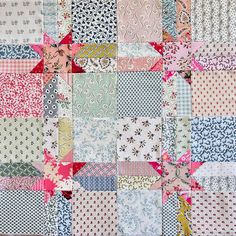 a patchwork quilt with many different patterns