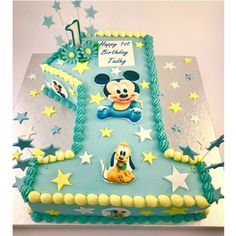 a birthday cake with mickey mouse on it