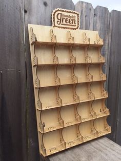 a wooden shelf with many shelves on it