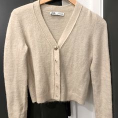 Perfect Condition, Never Worn Zara Beige V-neck Cardigan, Zara Beige V-neck Sweater, Cozy Zara Beige Cardigan, Cozy Beige Zara Cardigan, Zara Beige Winter Cardigan, Zara Beige Cardigan For Winter, Fitted Cream Zara Cardigan, Zara Cream Cardigan For Fall, Zara Beige Soft Knit Sweater