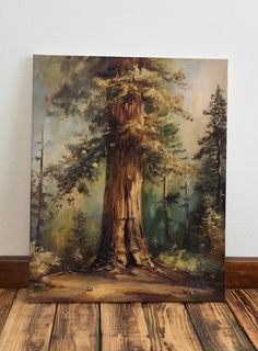 an oil painting on canvas of a tree in the middle of a forest with pine trees