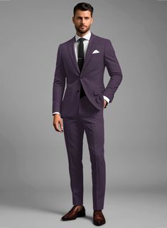 Luxury with a leisure aesthetic takes shape for the perfect man who wants to stand out on every occasion. Crafted with wool, micro fibre, lycra, our Napolean Stretch Purple Wool Suit has a bright purple color with a smooth texture and can be worn on chilly days to keep you warm and help you to look dapper at the same time.  Look Includes  Napolean Stretch Purple Wool Fabric  Two Button Jacket Style  Notch Lapel  Horn Royal Black Buttons  Single Vent  Three Cuff Buttons  Two Welted Back Pockets on Trousers   Click 'Customize Now' to modify the look if needed.  Lining: Viscose; Dry Clean. Royal Purple Suits For Men, Fitted Purple Suit For Formal Occasions, Fitted Purple Formal Suit, Tailored Purple Suit For Business, Tailored Purple Business Suit, Purple Notch Lapel Suit For Business, Classic Purple Blazer For Business, Classic Tailored Purple Blazer, Tailored Purple Blazer For Business