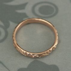 This is one of my new favorite designs! It's a lovely swirl flourish pattern that encircles the entire band. This is a deep detailed design--so elegant and pretty. You won't be disappointed. The band measures 3mm wide by 1.5mm thick making it a nice substantial band to last a lifetime and then some! Your ring will be hand made to size just for you in solid 14K gold (rose, yellow, or white). Blazer Arts is a family-owned and operated small but growing business that first opened up shop on Etsy in Growing Business, Vintage Style Rings, Palm Coast, Pattern Ring, Rose Gold Band, Detailed Design, Rose Yellow, Womens Wedding Bands, Swirl Pattern