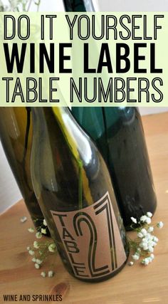 two wine bottles sitting on top of a table with the words do it yourself wine label tables