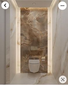 a bathroom with marble walls and flooring