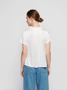 The V neck version of your favorite luxe Hammered Satin tee with a laid-back ribbed neckband. Sexy, effortless, and already a classic. (This one comes in White.) | Women's June Short Sleeve Top in White | Ethical Essentials Tap Water, Cropped Tee, Wrinkle Remover, Crop Tee, Short Sleeve Top, V Neck Tee, World Of Fashion, Short Tops, Modern Woman