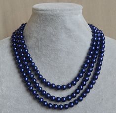 I make the necklace to use 8mm navy blue glass pearls.The necklace length is 16-18 inches .IT is good necklace for your great wedding. I can make different type necklace to your requirements,Please feel free to contact me if you have any question. Thank you so much. . Elegant Blue Necklaces With 8mm Beads, Blue Pearl Necklace For Formal Occasions, Elegant Blue Necklace With 8mm Beads, Blue Round Beads Pearl Necklace For Wedding, Blue Pearl Necklace For Party, Blue Pearl Necklace With Round Beads For Wedding, Formal Blue Pearl Necklace, Luxury Blue Pearl Drop Necklace, Adjustable Polished Blue Pearl Necklace