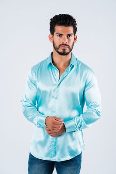 Measurements: Model is wearing size Medium. Fabric: Satin Fit: Relaxed fit About: This solid-colored satin dress shirt from Platini Jeans will enhance your fashionable wardrobe. The head-turning color adds flair to the classic long sleeve shirt. A relaxed fit delivers sleek style, and the point collar provides a modern finishing touch. Details & Features: Satin Point Collar Long sleeve Button closure Modern Fit Machine Washable Classic style