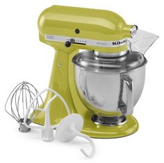 a yellow kitchen aid mixer with attachments