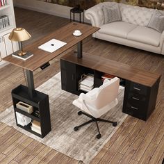 a computer desk sitting on top of a hard wood floor next to a couch and chair