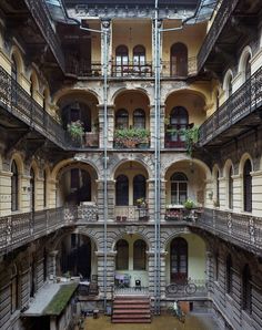 the inside of an old building with many balconies