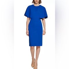 Bring Out Your Sophisticated Style With This Sheath Dress From Calvin Klein, Framed With Chic Capelet Sleeves. Runs True To Size Tailored Fit Through The Chest, Waist, And Hips; Sits Close To The Body Scuba Crepe: Stretchy And Supportive Crewneck; Sheath Silhouette Concealed Back Zipper Closure Elbow-Length Capelet Sleeves Banded Waist Lined Polyester/Spandex; Lining: Polyester Dry Clean Like New - Never Worn Elegant Blue Midi Dress With Flutter Sleeves, Blue Flutter Sleeve Midi Dress For Evening, Calvin Klein Sheath Midi Dress For Office, Calvin Klein Spring Midi Dress For Office, Calvin Klein Spring Office Dress, Chic Calvin Klein Short Sleeve Mini Dress, Elegant Short Sleeve Midi Dress By Calvin Klein, Summer Office Dresses By Calvin Klein, Calvin Klein Elegant Short Sleeve Midi Dress