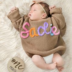 Here, we focus on creating custom and personalized baby/toddler/children's sweaters with a sense of artistic pride. Each sweater is adorned with a baby's name and hand embroidered with rough yarn on the chest. DESCRIPTION: Each sweater proves our meticulous craftsmanship, handmade and hand embroidered on high-quality, ultra soft 100% pure cotton oversized sweaters (carefully designed and crafted by us). Handembroidered baby sweaters are an excellent gift choice for baby showers, newborn/family p Name Sweater Baby, Embroidered Name Sweater, Chrsitmas Gift, Baby Name Sweater, Newborn Sweater, Name Sweater, Newborn Family Photos, Pull Bebe, Cadeau Baby Shower