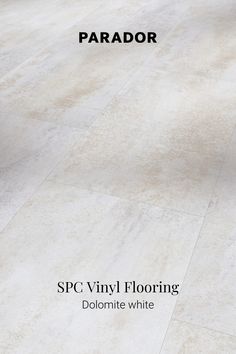 a white tile floor with the words spc vinyl flooring dornite white