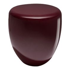 an image of a small stool that is maroon in color and has a rounded top