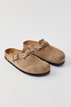 Birkenstock Boston braid clogs in ultra-soft suede topped with a braided detail. Easy slip-on Birkenstock shoe style complete with a contoured cork footbed with extra cushioning that gives them a supportive feel with every step. Features Birkenstock Boson braided suede clogs Suede Birkenstock shoes Classic Birkenstock Boston clogs Braided detail in soft suede Cushioned cork footbed for a supportive fit Easy slip-on clogs Content + Care Suede, leather, cork, EVA Spot clean Imported Size + Fit Bir Clogs Birkenstock, Birkenstock Clog, Birkenstock Clogs, Boston Clogs, Suede Clogs, Men's Shoes Accessories, Suede Tops, Shoes Classic, Birkenstock Boston