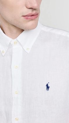 Fabric: Lightweight, non-stretch linen weave.Embroidered logo at breast.Button-down collar and button placket.Short sleeves.Shell: 100% linen.Wash cold.Imported, Philippines Classic Ralph Lauren Short Sleeve Shirt, Ralph Lauren Short Sleeve Relaxed Fit Shirt, Classic Collared Ralph Lauren T-shirt, Short Sleeve Linen Shirt, Ralph Lauren Cotton Short Sleeve T-shirt, Ralph Lauren Short Sleeve Logo T-shirt, Linen Shirts Women, Polo Ralph Lauren Shorts, Ralph Lauren Shorts