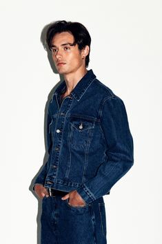 A classic, fitted denim jacket inspired by old school American westerns. With a slim-straight fit and a belt-line crop that tapers into the waist, Runyon is effortless and rugged. An everyday layer for the California cowboy. Pair with the Rodeo Classic Straight Leg Jeans for the ultimate Canadian Tuxedo. Classic Rigid Denim Outerwear For Fall, Classic Dark Wash Rigid Denim Outerwear, Spring Dark Wash Rigid Denim Jacket, Classic Fitted Medium Wash Denim Jacket, Fitted Denim Jacket With Pockets In Rigid Denim, Dark Wash Fitted Denim Jacket For Everyday, Fitted Dark Wash Denim Jacket, Fitted Dark Wash Denim Jacket For Everyday, Fitted Denim Jacket With Pockets