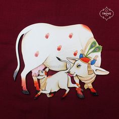 two white cows are standing next to each other on a red background with hand prints