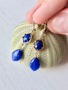 Lapis Lazuli Earrings, Navy Blue Dangle Earrings, September Birthstone, Blue Lapis Earrings in Gold, Earrings for women, Gift for her These Indigo Blue Drop Earrings feature lapis lazuli hexagonal stones framed in 14k gold filled and suspended from them are lapis lazuli teardrops, wire wrapped in 14k Gold Filled. The Earrings are suspended from gold filled lever back ear wires. These are ideal for a night out, they are a great choice for causal wear and they will provide a beautiful pop of color Blue Linear Earrings With Ear Wire For Gift, Blue Teardrop Earrings With Lever Back As Gift, Blue Nickel-free Linear Earrings For Gift, Elegant Blue Nickel-free Linear Earrings, Teardrop Lapis Lazuli Earrings For Gift, Lapis Lazuli Teardrop Earrings For Gifts, Blue Lapis Lazuli Drop Earrings, Blue Gemstone Teardrop Dangle Earrings, Lapis Lazuli Teardrop Earrings As Gift