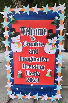 a welcome sign with snowmen and stars on it for the festive holiday season