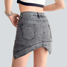 Achieve edgy. street style with our 2023 Summer Collection Asymmetric Mini Denim Skort! This mid-waist skort is stonewashed to perfection. offering a distinctive distressed pattern that oozes grunge galore. With a sleek slim fit and a resilient zipper and button closure. it's the ultimate expression of rebellion and sophistication.Key Highlights: Grunge Galore: Inspired by the iconic '90s grunge movement. this skort exudes an effortlessly cool attitude. Distinctive Distressed Pattern: Expertly c Trendy Slim Fit Mini Denim Skirt, Trendy Stretch Mini Skirt With Frayed Hem, Edgy Denim Mini Skort, Edgy Mid-rise Fitted Jean Shorts, Edgy Fitted Mid-rise Jean Shorts, Trendy Fitted Jean Shorts With Frayed Hem, Trendy Fitted Jean Shorts For Streetwear, Edgy Mini Bottoms With Frayed Hem, Trendy Fitted Cutoff Bottoms