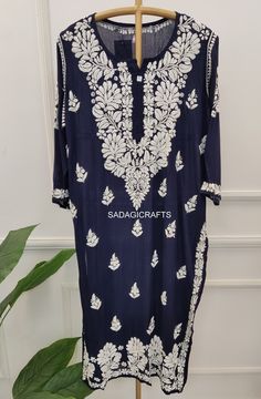 DESCRIPTION ▪ Fabric: Modal ▪ Sleeves: 3/4 Sleeves ▪ Style: Straight Kurti ▪ Length: 44-46 Inches ▪ Occasions: Casual Wear, Office Wear, Festive Wear ▪ Garment Care: Hand Wash Only ▪ Net Content: Only Kurti Traditional Half Sleeve Summer Kurta, Blue Long Kurta For Diwali, Traditional Fitted Kurta With 3/4 Sleeves, Summer Festive Kurta With 3/4 Sleeves, Festive Traditional Half Sleeve Kurta, Summer Party Kurta With Chikankari Embroidery, Traditional Embroidered Kurta With 3/4 Sleeves, Traditional Chikankari Embroidery Kaftan For Party, Traditional Embroidered 3/4 Sleeve Kurta